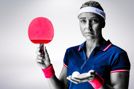 Composite image of female athlete is ready to playの写真素材
