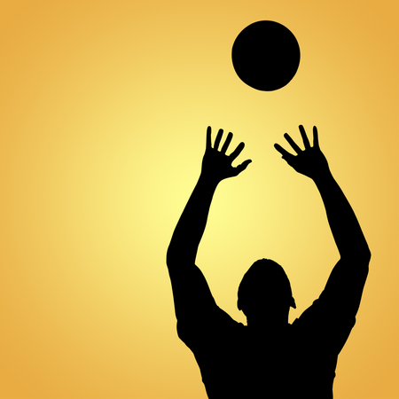 Sportsman throwing volleyball while playing against yellow vignetteの写真素材