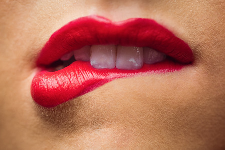 Close up of lips with makeup on them in a studio
