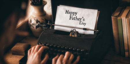 Hands typing on typewriter happy fathers dayの写真素材