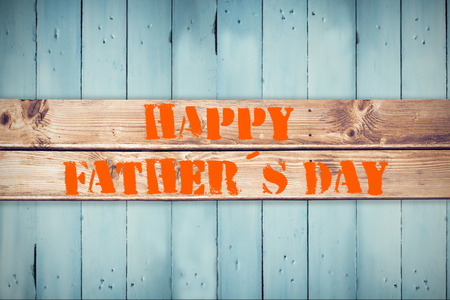 Happy fathers day against wooden backgroundの写真素材