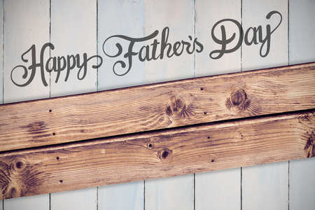 Fathers day greeting against wooden planks backgroundの写真素材