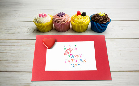 Happy fathers day against wooden plank backgroundの写真素材