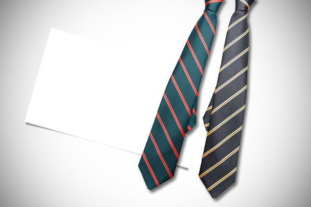 blue tie with diagonal line against white background with vignetteの写真素材