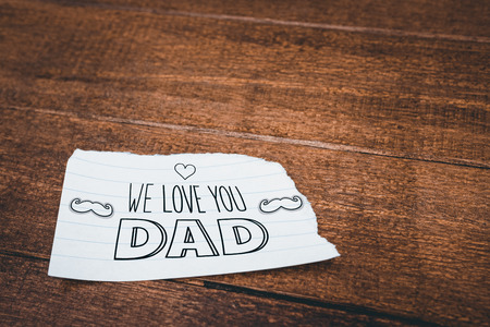 fathers day greeting against close up view of a piece of paperの写真素材