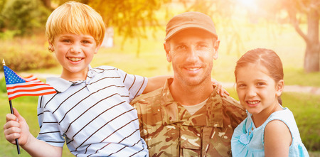 Portrait of  smiling army Officer with children in parkの写真素材