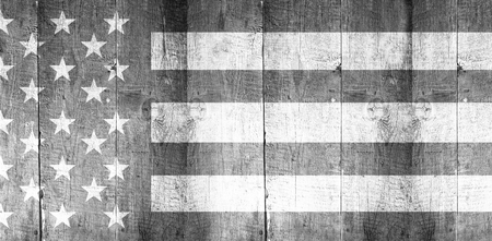 USA national flag against weathered oak floor boards backgroundの写真素材