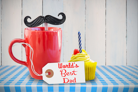 Worlds best dad message in front of coffeeの写真素材