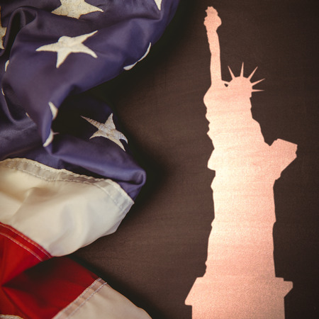 Focus on liberty statue  against white background with vignetteの写真素材