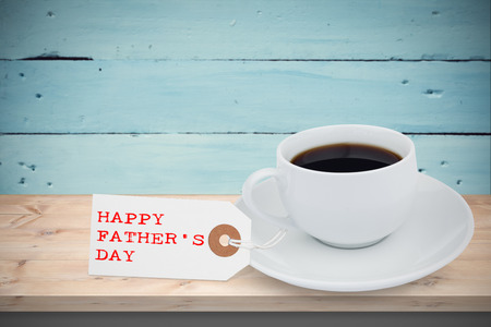 Happy fathers day message in front of coffeeの写真素材