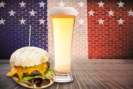 Focus on hamburger against composite image of usa national flagの写真素材