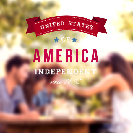 Independence day graphic against happy friends in the park having lunchの写真素材