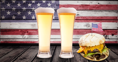 Focus on hamburger against composite image of usa national flagの写真素材