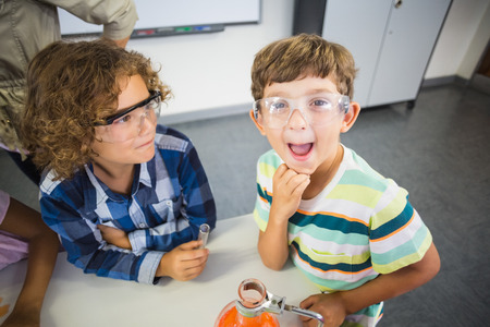 Kids posing in laboratory at schoolの写真素材