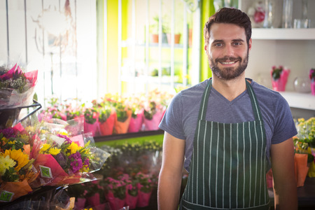 Portrait of male florist at his flower shopの写真素材