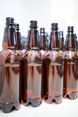 Close-up of empty beer bottles in beweryの写真素材