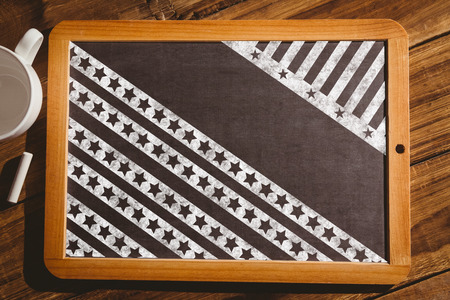 Focus on stars  against chalkboard on desk