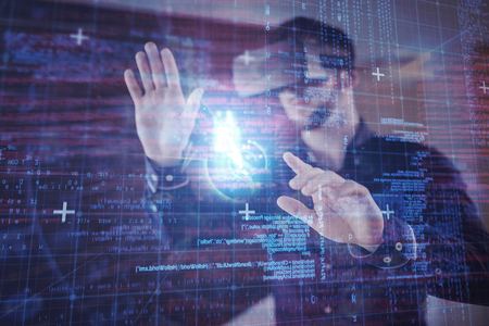 Blue and red technology interface against man wearing virtual glassの写真素材