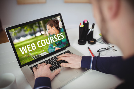 Web course ad against cropped image of man using laptopの写真素材