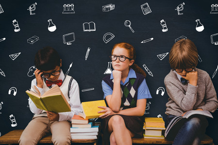 School kids against blackboard