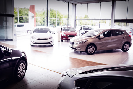View of row new car at new car showroomの写真素材