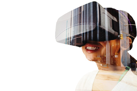 Close up of little girl holding virtual glasses against new york streetの写真素材