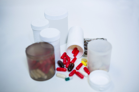 Close-up of various prescription medicines on table in pharmacyの写真素材