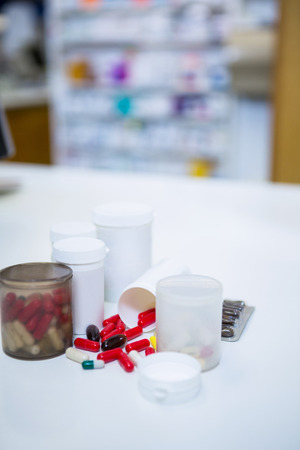 Close-up of various prescription medicines on table in pharmacyの写真素材