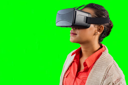Close up of teacher holding virtual glasses against green vignette