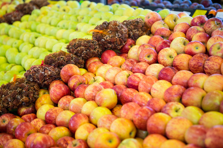 Variety of fruits in organic section of supermarketの写真素材