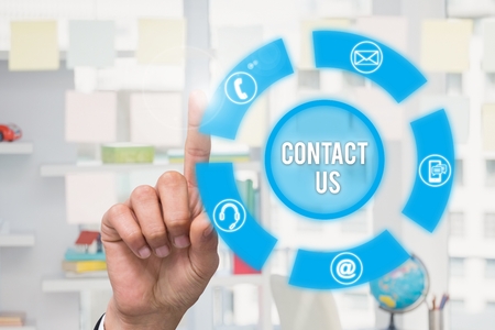 composite of hand hand pointing at contact us graphics
