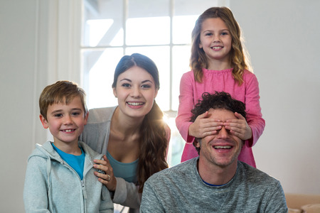 Happy family having fun together at homeの写真素材