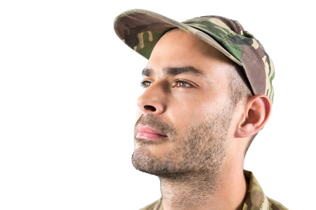 Close-up of confidence soldier against white background