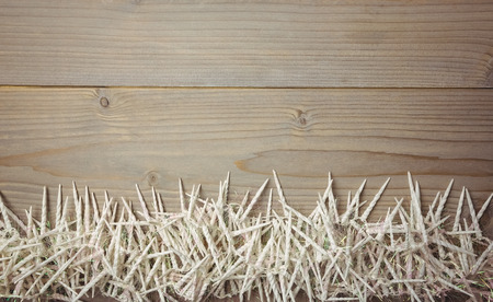 Close-up of mini spiral candle scattered on wooden tableの写真素材