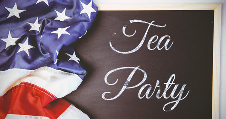 tea party against american flag on chalkboardの写真素材