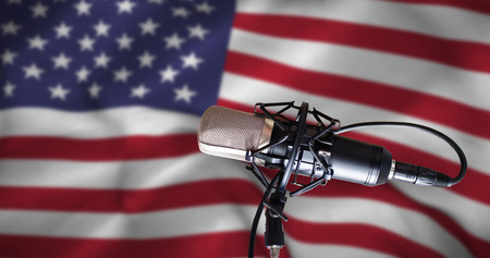 Condenser microphone against american flagの写真素材