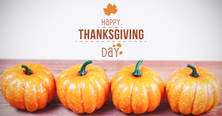 Happy thanksgiving against white background with vignetteの写真素材