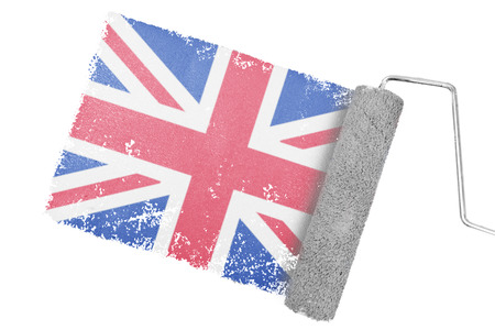 Great british national flag against gray paint with rollerの写真素材