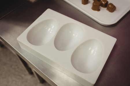 Close-up of chocolate mould in kitchen