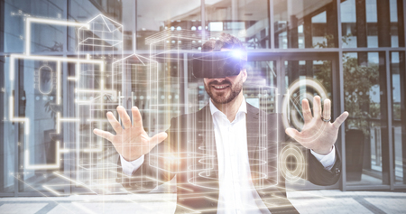 Blueprint interface against businessman using reality virtual headset