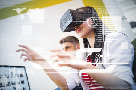 interface against low angle view of executive enjoying augmented reality headset at creative office