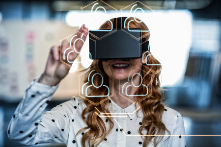 Digital image of social connectivity in hexagon shape against woman wearing virtual reality glass