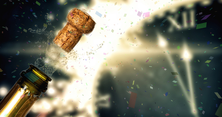Flying colours against close up of champagne cork poppingの写真素材