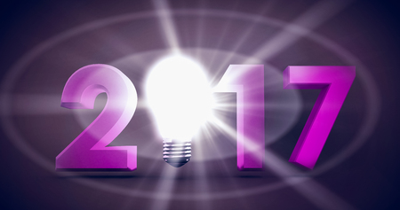 2017 with glowing light bulb over white background against dark brown backgroundの写真素材