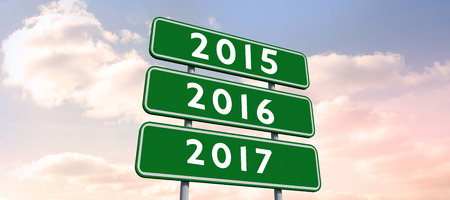 Digital image of new year 2017 against colored sky with clouds