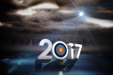 Number with sports target against stormy sky with tornado over roadの写真素材