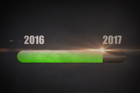 Green loading display against blackboardの写真素材