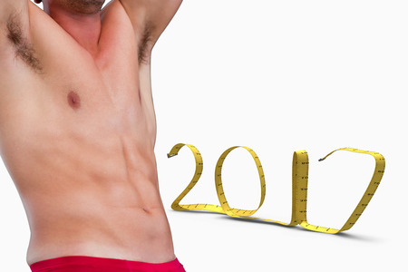Bodybuilder  against white background with vignetteの写真素材