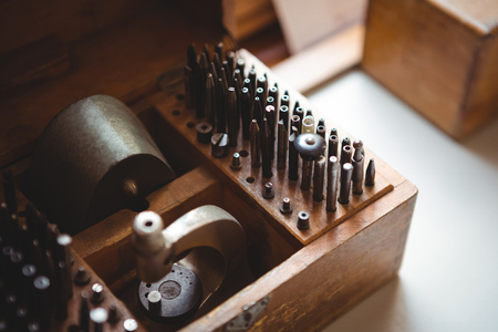 Close-up of drill bit set in a holder at workshopの写真素材