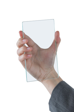 Close-up of hands pretending to hold mobile phone against white backgroundの写真素材